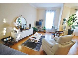 Parquet floors and high ceilings make..