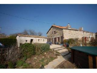 St Marc La Lande. Pretty stone house..
