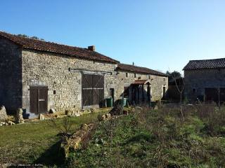 Renovated stone house with attached..