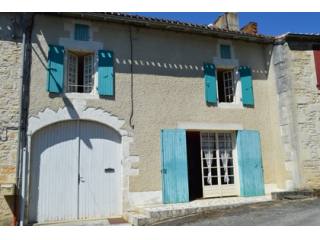 Three-bed village property with garden..