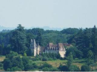 Chateau and its various outbuildings..