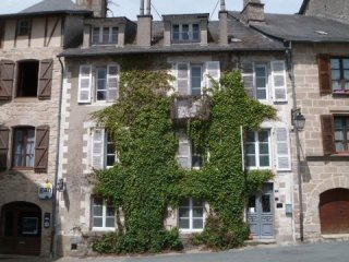 Village House with Lots of Potential