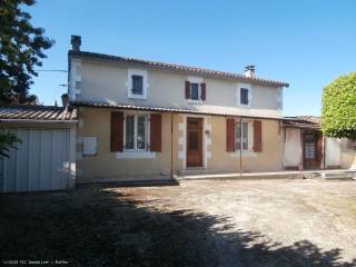 Stone house with outbuildings and..