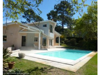 House with pool on the golf course..
