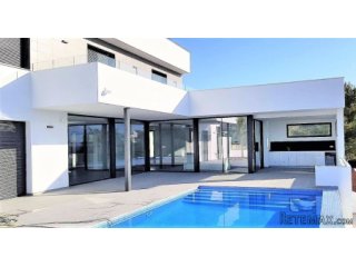 Recently finished modern villa on an elevated plot with..