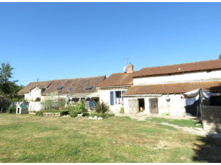Big country house and barns with an..