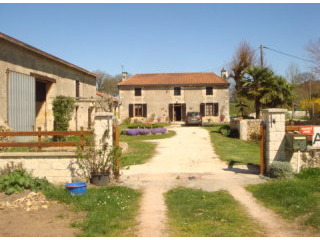 Farmhouse with big barn and large..