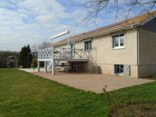 House with Landscaped Gardens