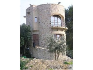 Unusual property. Historic stone tower and toolshed on a..
