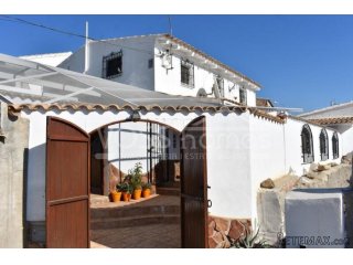 A very large & impressive village house. The main house has..