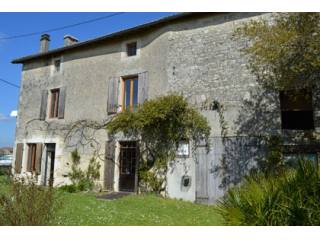 Village property with pretty garden..