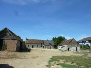 Farmhouse with Rural Outbuildings