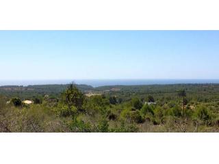 Rustic plot with fantastic sea views..