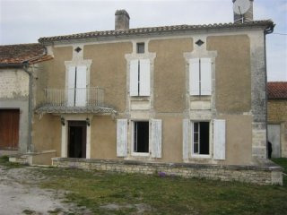 Farm : 2 houses & outbuildings set on..