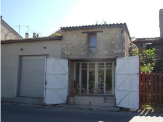 Riverside Stone House In A Lively..