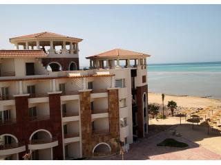 Beachfront Penthouse with Panoramic Sea..
