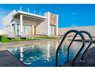 These villas are built near the bustling shopping center of..