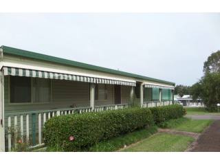OPPOSITE THE OPEN LAWN AREA, with..