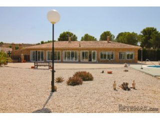 The villa boasts a fully fenced plot, accessed via electric..