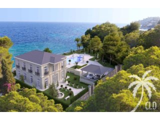 This seafront mansion has a gorgeous, elegant and timeless..