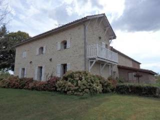 This Attractive Stone House Offers Good..
