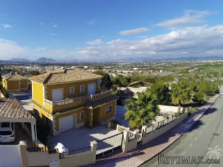 Detached luxury villa on a corner plot with private pool..