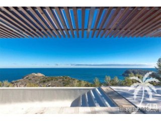 Seafront mansion under construction with spectacular sea..
