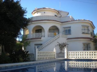 Nostalgic living in a very large Spanish villa near the..