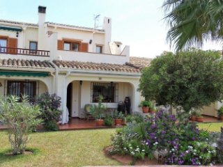 Beautiful townhouse in a small and charming complex with..
