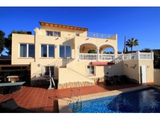 This imposing villa is distributed over two levels plus..