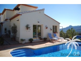 An impressive villa with breathtaking views situated close..