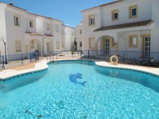 Town House - Located midway between..