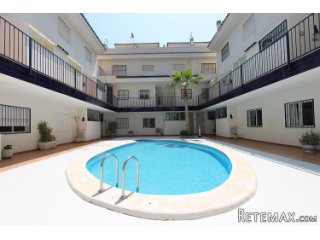 This modern duplex apartment can be found in bustling..
