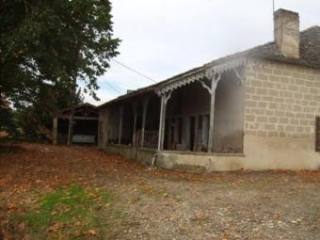 A Large Stone Farmhouse In Need Of..