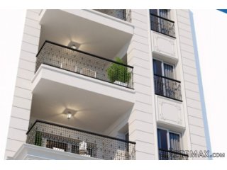 Building of 4 heights with one apartment per floor, all of..