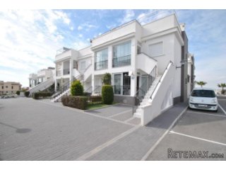 This modern ground floor apartment is located in bustling..