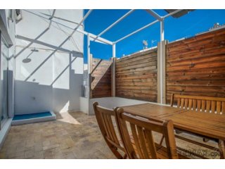 This three bedroom apartment is situated in the centre of..