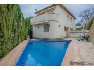 This two-storey semi-detached house with private pool is..