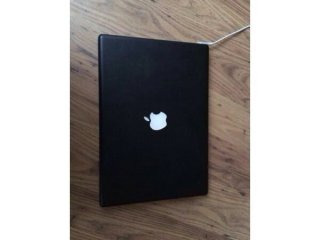 2 x MacBooks (1 Black, 1 White)