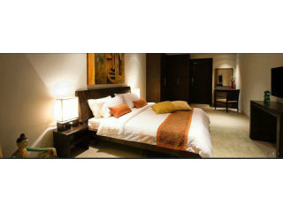 Hotel-Serviced Beachfront Condominium..