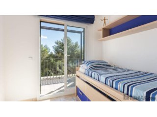 Casa adosada situada en la tranquila zona de Cala Vinyes...