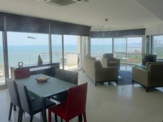 2 bedroom beachfront designer-condo..