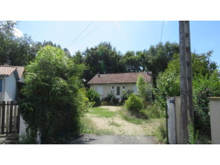 Bungalow with large garden at the end..
