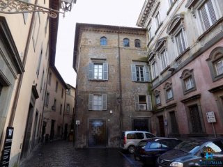Historic apartment with large roof..
