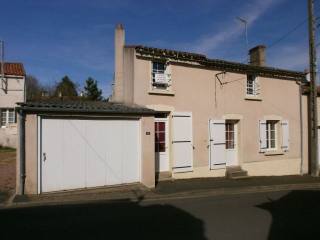 French House with Garage and Garden
