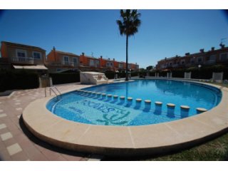 Great price for this bright duplex with a private plot of..