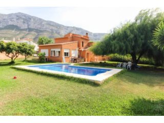 This villa built in rustic style is located on a spacious..