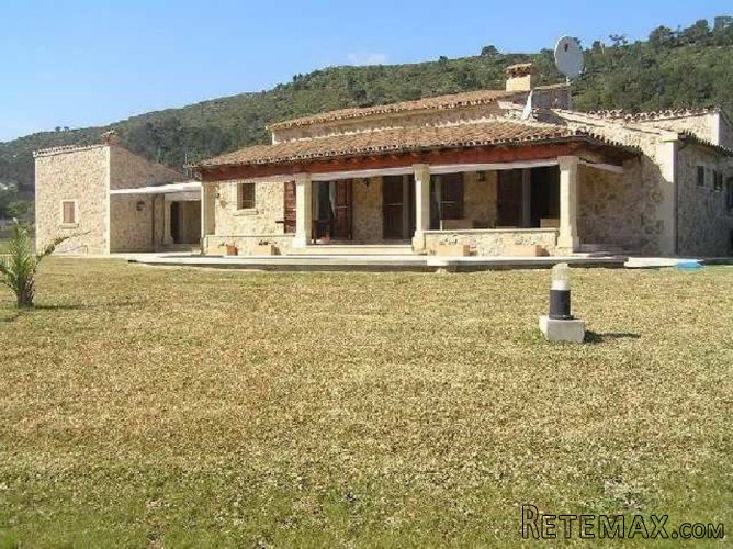 Stone-clad one storey villa, decorated in very modern style..