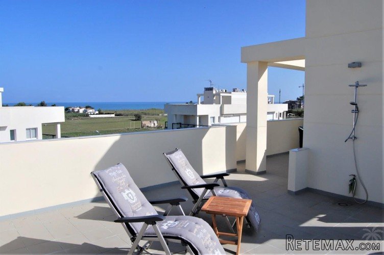 This modern penthouse ( with solarium ), is located in one..
