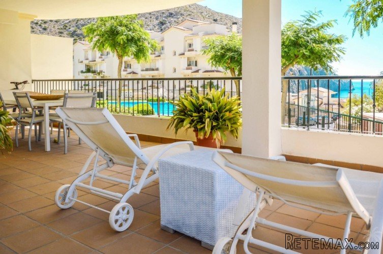 This two-bedroom apartment with lovely sea views and a..